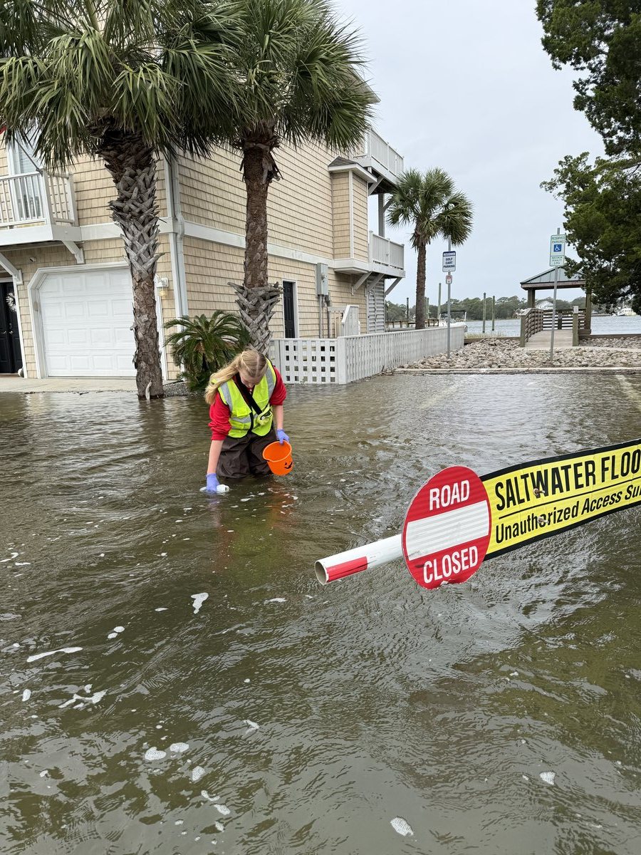 Tidal floodwater in a coastal neighborhood in Carolina Beach, NC